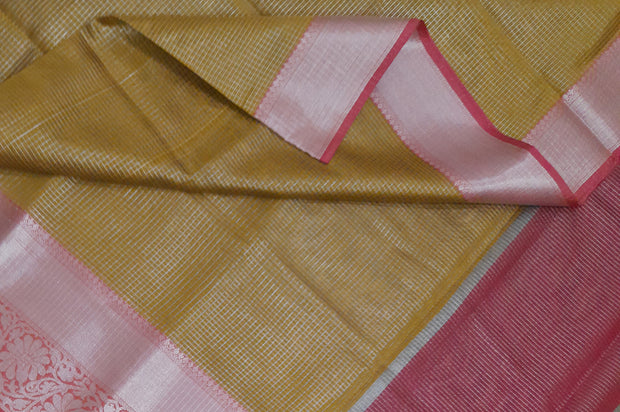 Handloom Banarasi silk cotton saree in honey in  checks with floral pattern in border
