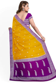 Banarasi silk chiffon  saree in mustard  with silver buttis & border and a contrast pallu in purple