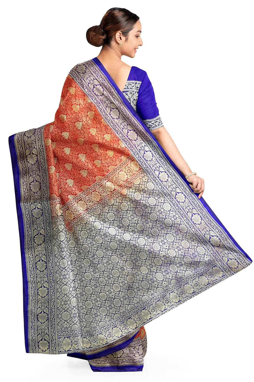 Handloom Banarasi silk saree in satin weave in red with floral motifs all over the body.