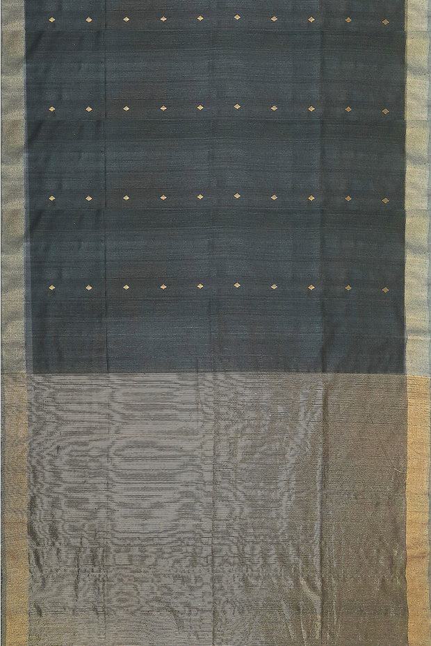 Matka silk saree in black with small  zari  motifs.