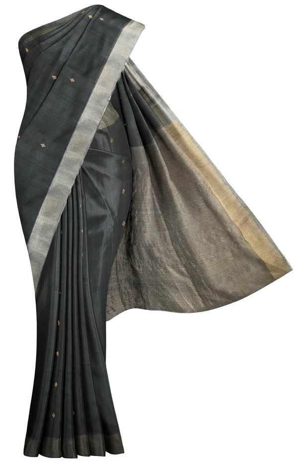 Matka silk saree in black with small  zari  motifs.