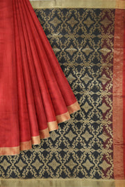 Matka silk saree in red with a  jamdani weave pallu in geometric pattern
