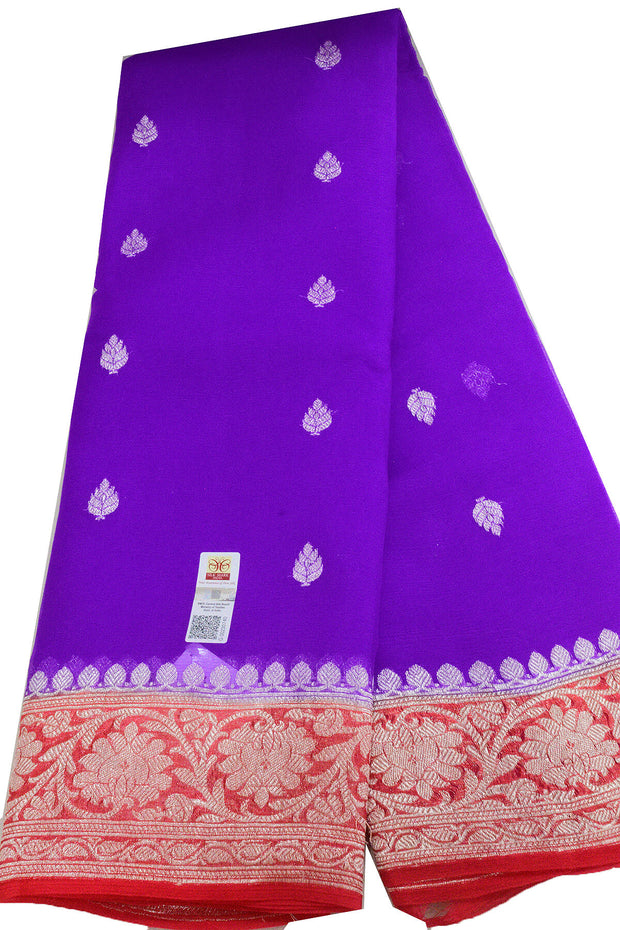 Banarasi silk chiffon  saree in violet  with silver buttis & border and a contrast pallu in red