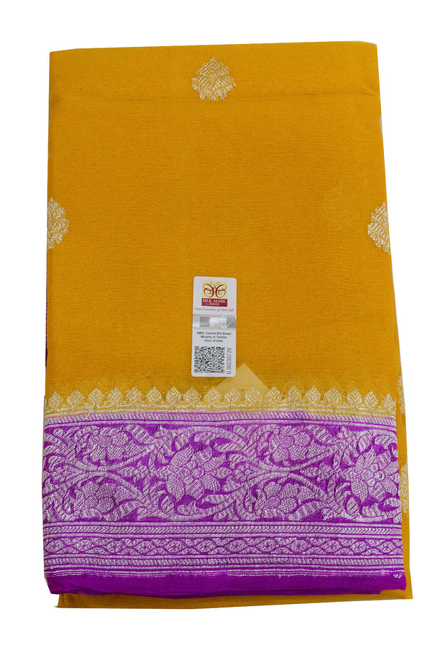 Banarasi silk chiffon  saree in mustard  with silver buttis & border and a contrast pallu in purple