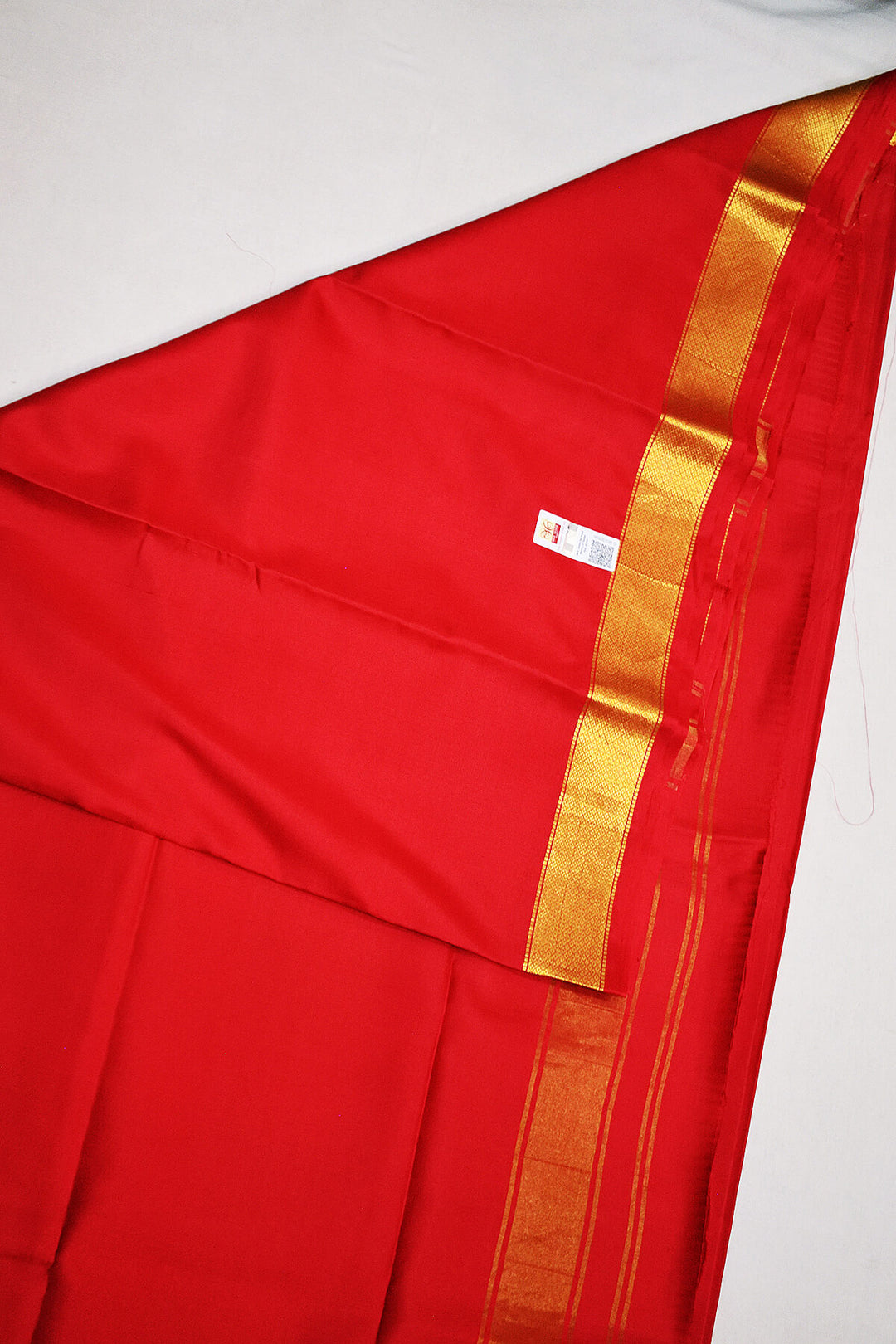 Pure silk Dhoti /Panche in red  with 2 inch gold border