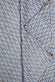 Handwoven Ikkat pure silk fabric in dupioni finish in silver