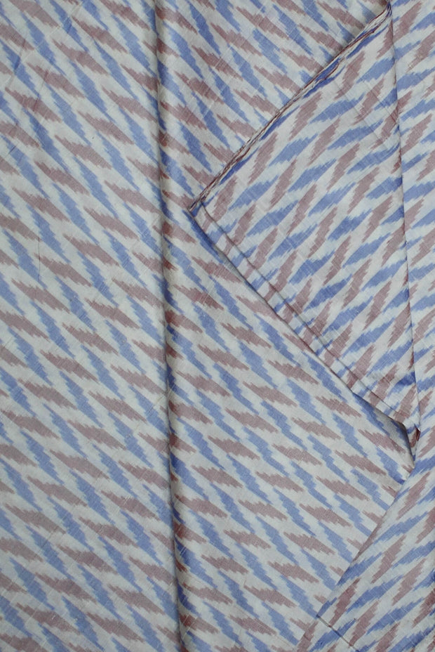 Handwoven Ikkat pure silk fabric in dupioni finish in silver