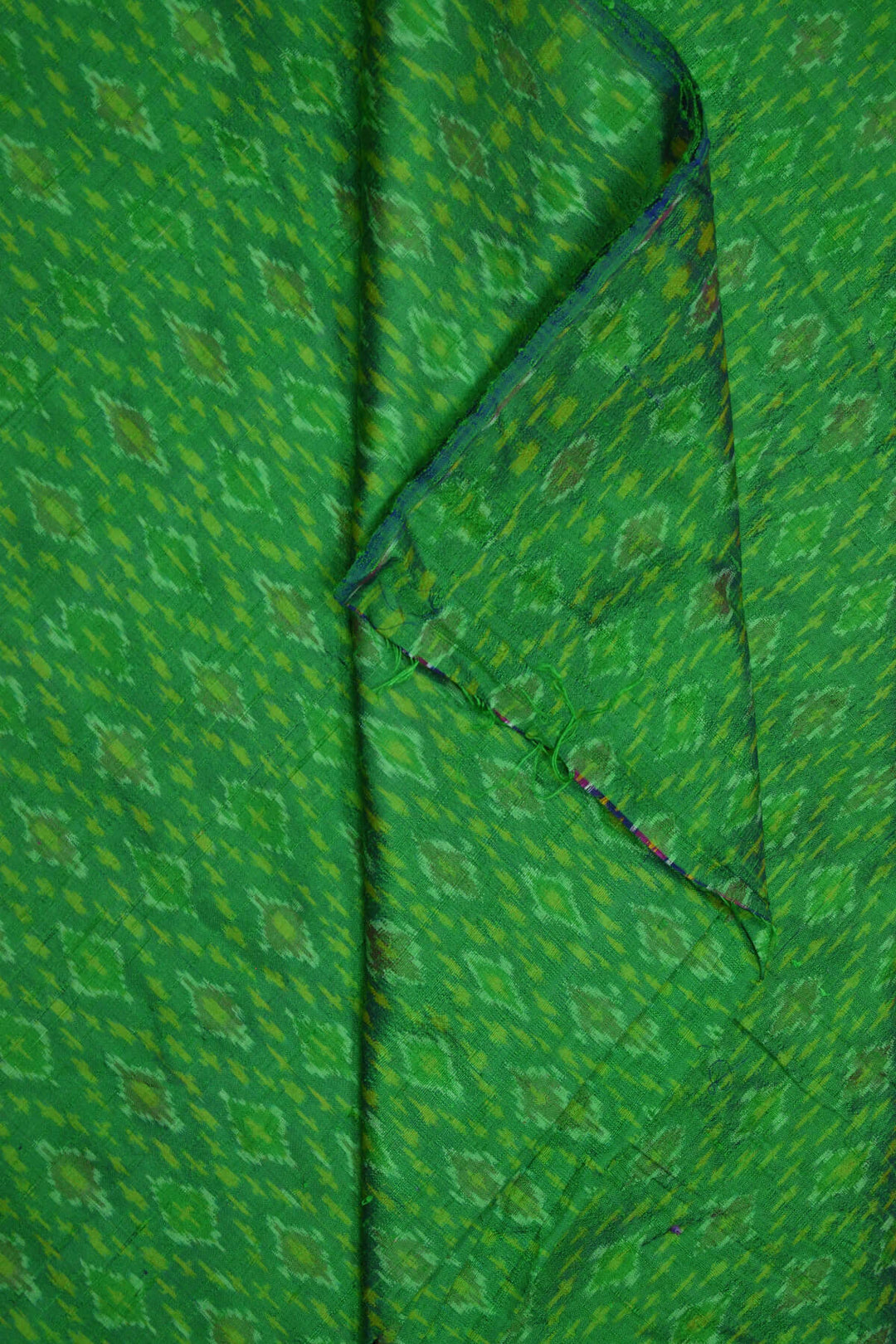 Handwoven Ikkat pure silk  fabric in dupioni finish in green