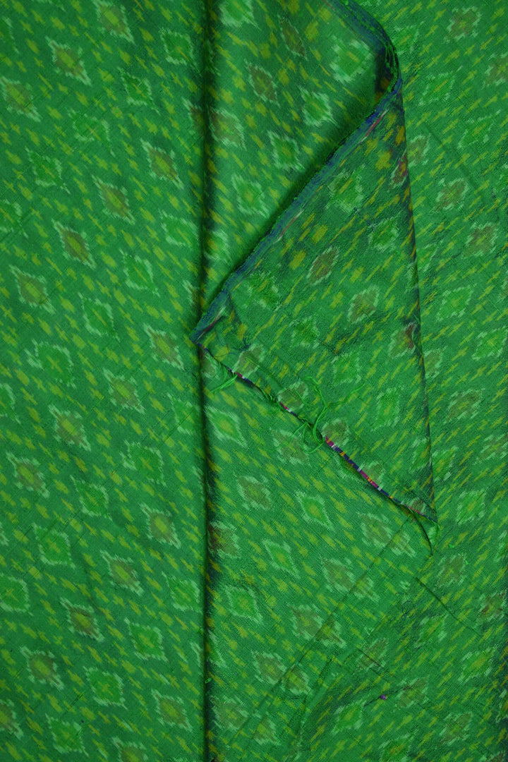 Handwoven Ikkat pure silk  fabric in dupioni finish in green