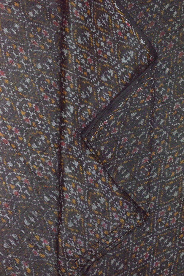 Handwoven Ikkat pure silk  fabric in dupioni finish in black.