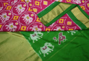 Handwoven Ikat pure silk saree in pink with elephant motifs and a big zari border