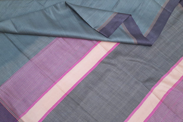 Handwoven Eri pure silk saree in slate grey with  striped pallu.