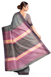 Handwoven Eri pure silk saree in slate grey with  striped pallu.