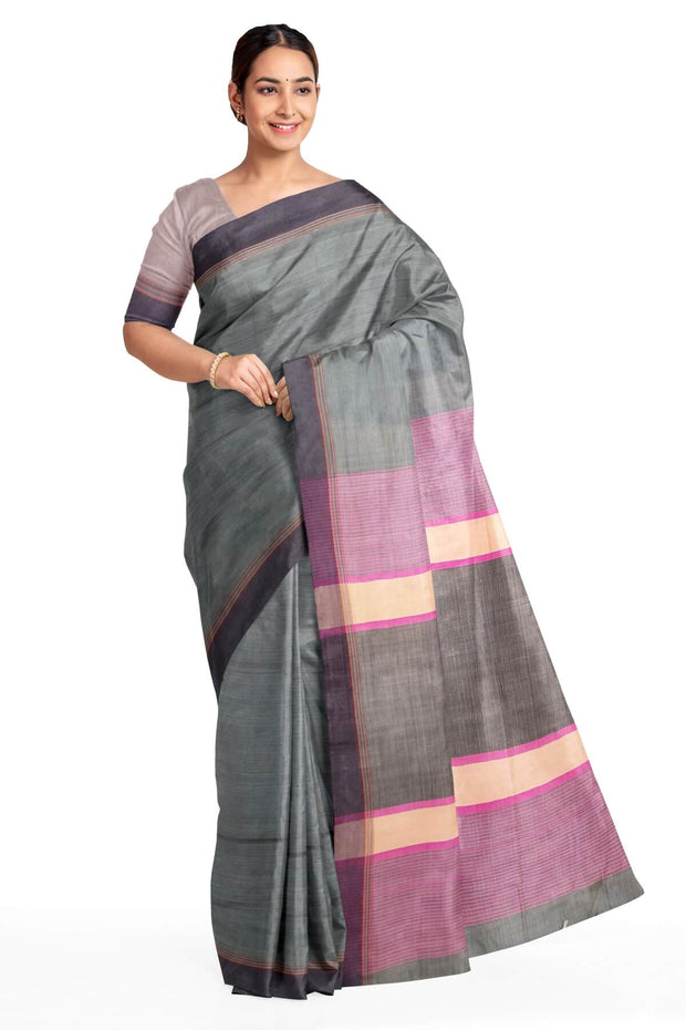 Handwoven Eri pure silk saree in slate grey with  striped pallu.