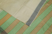 Handwoven Eri pure silk saree in cream with  striped pallu.