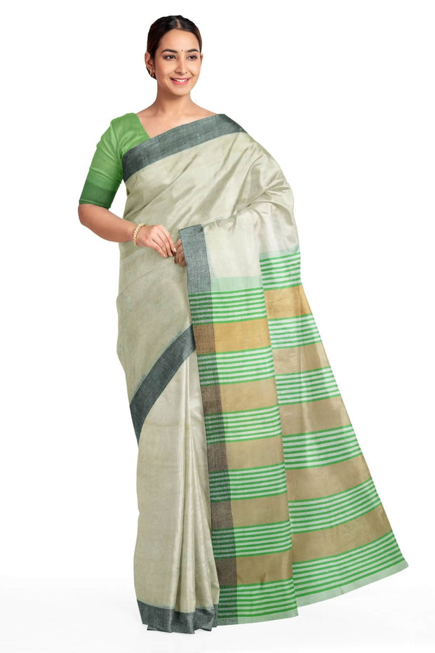 Handwoven Eri pure silk saree in cream with  striped pallu.