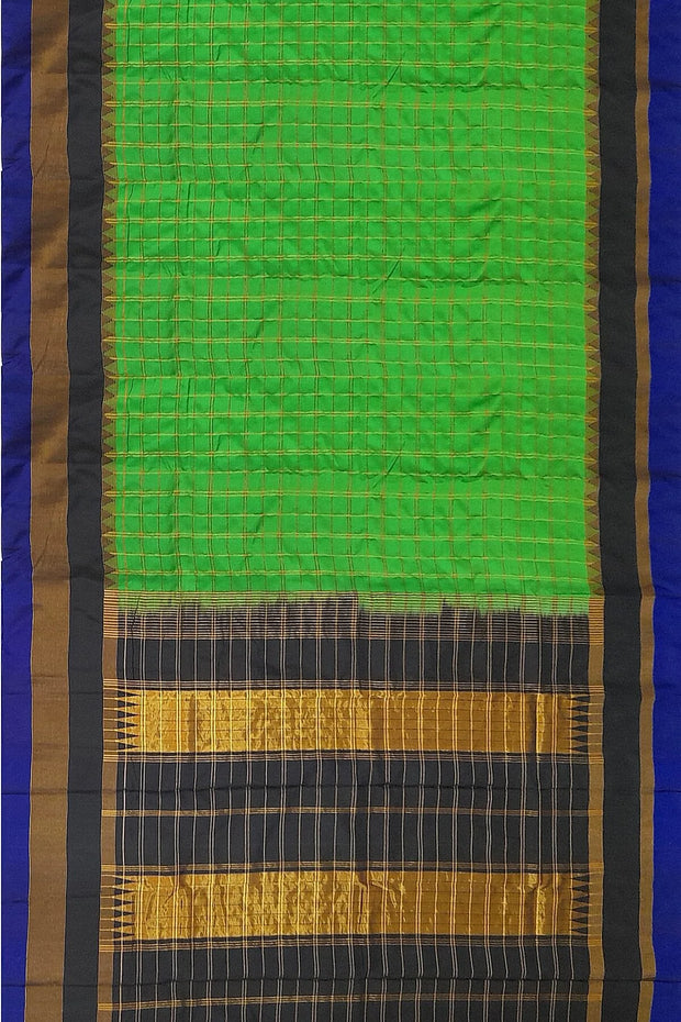 Handwoven Gadwal pure silk saree  in green in checks pattern