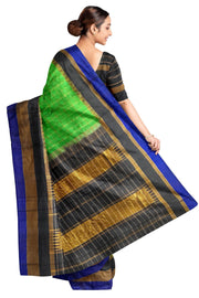 Handwoven Gadwal pure silk saree  in green in checks pattern