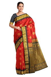 Handwoven Gadwal pure silk saree in red with disc & floral motifs and rich pallu with temple border