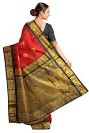 Handwoven Gadwal pure silk saree in red with disc & floral motifs and rich pallu with temple border