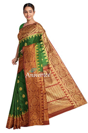 Handwoven Gadwal pure silk saree in bottle green with gold motifs
