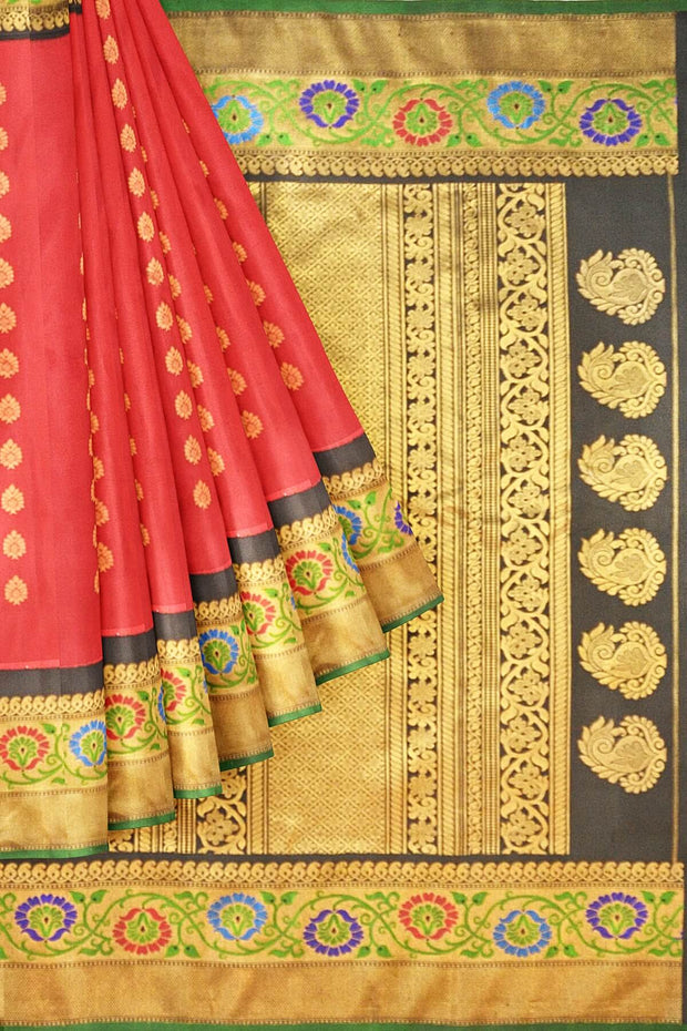Handwoven  Gadwal pure silk  saree with floral motifs all over the body  and a kuttu border with floral meena work