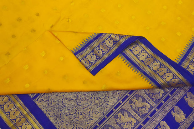 Gadwal pure silk saree in yellow with floral & peacock motifs in gold