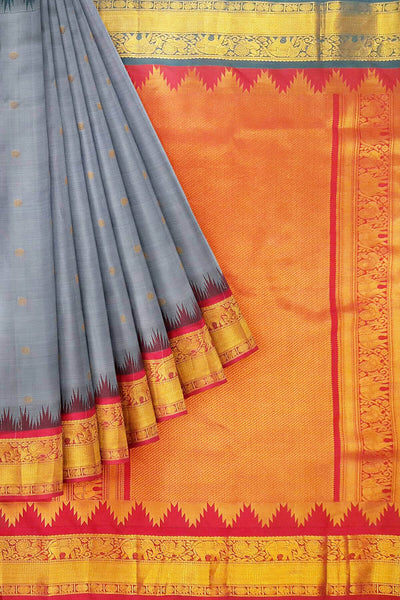 Gadwal pure silk saree in ash grey with small motifs on the body.