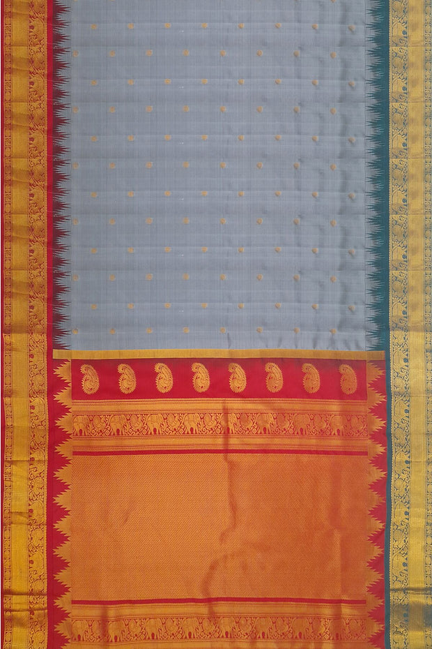 Gadwal pure silk saree in ash grey with small motifs on the body.