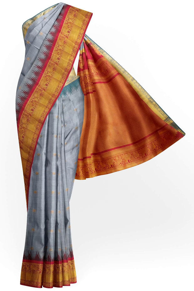 Gadwal pure silk saree in ash grey with small motifs on the body.