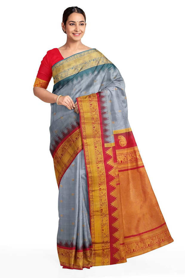 Gadwal pure silk saree in ash grey with small motifs on the body.
