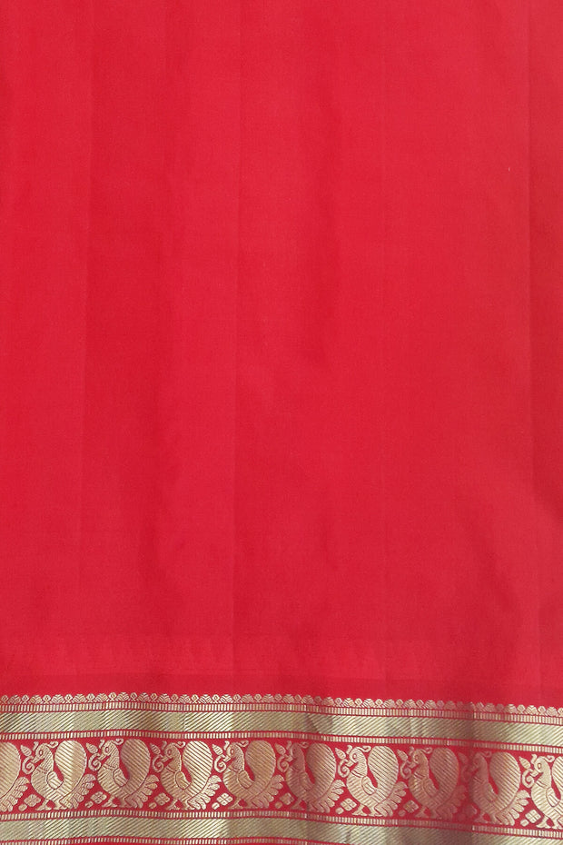 Gadwal pure silk saree in yellow with small motifs on the body