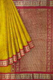 Gadwal pure silk saree in yellow with small motifs on the body
