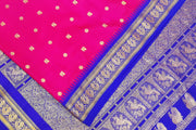 Gadwal pure silk saree in pink with peacock & floral motifs on the body