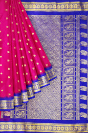 Gadwal pure silk saree in pink with peacock & floral motifs on the body