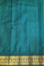 Gadwal pure silk saree in leaf green with small motifs on the body