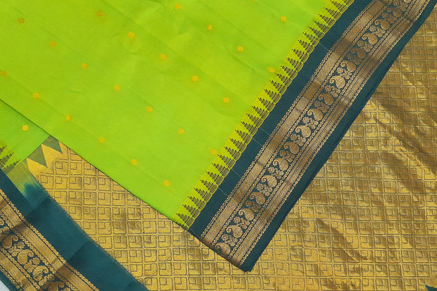 Gadwal pure silk saree in leaf green with small motifs on the body