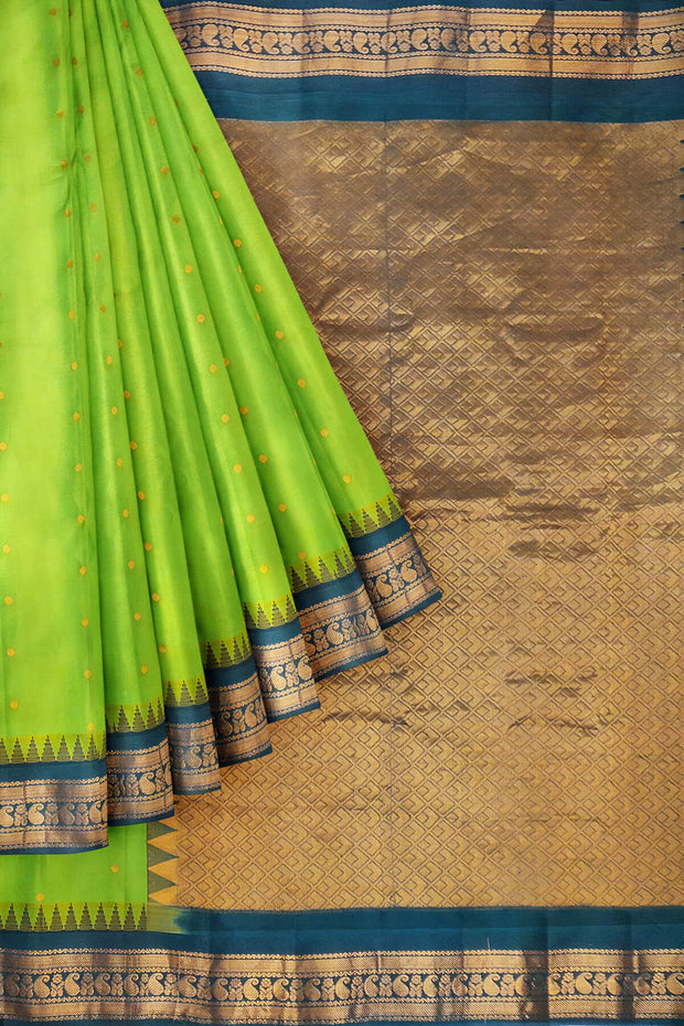 Gadwal pure silk saree in leaf green with small motifs on the body