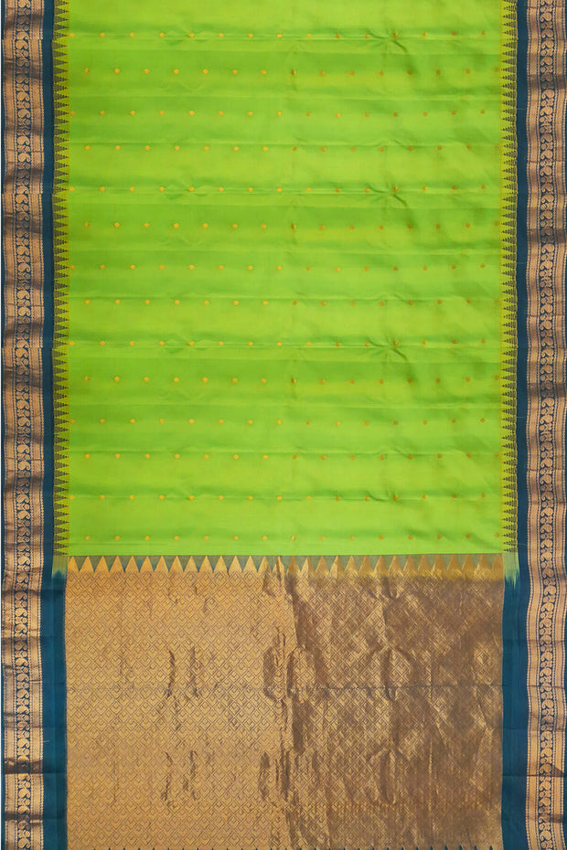 Gadwal pure silk saree in leaf green with small motifs on the body