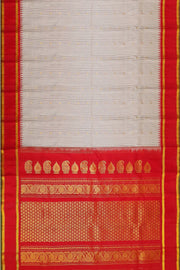 Handwoven Gadwal pure silk saree in off white with fine checks and gold buttis.