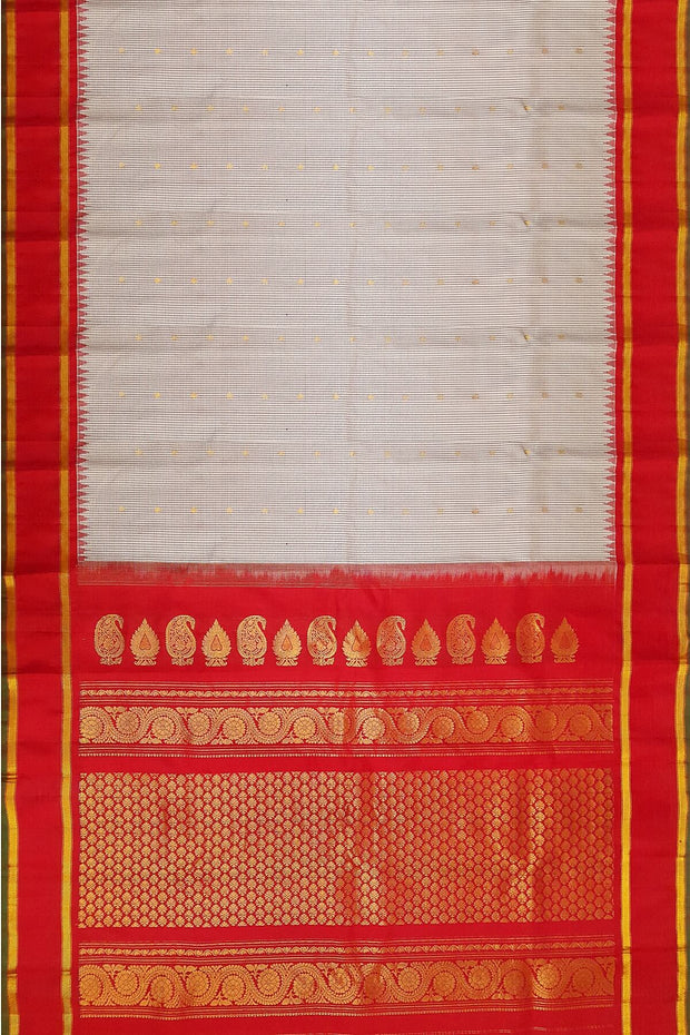Handwoven Gadwal pure silk saree in off white with fine checks and gold buttis.