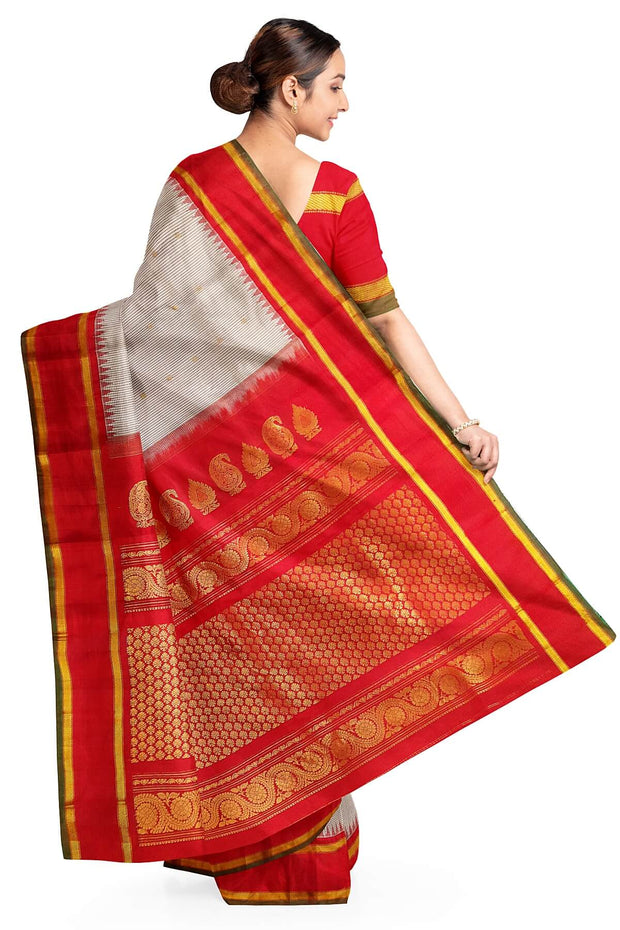 Handwoven Gadwal pure silk saree in off white with fine checks and gold buttis.