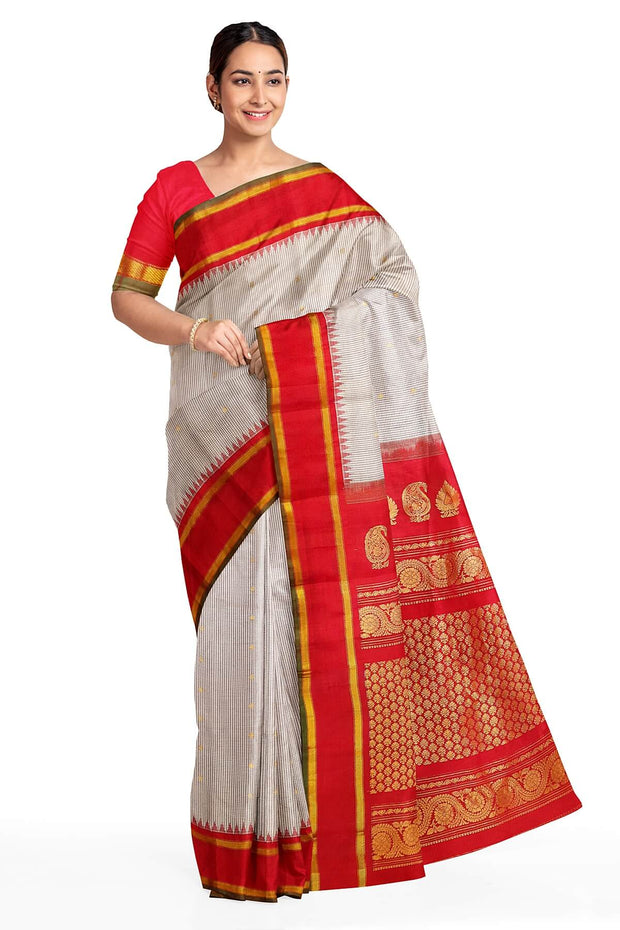 Handwoven Gadwal pure silk saree in off white with fine checks and gold buttis.