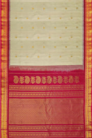 Handwoven Gadwal pure silk saree in cream with  gold buttis.