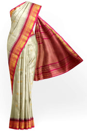 Handwoven Gadwal pure silk saree in cream with  gold buttis.