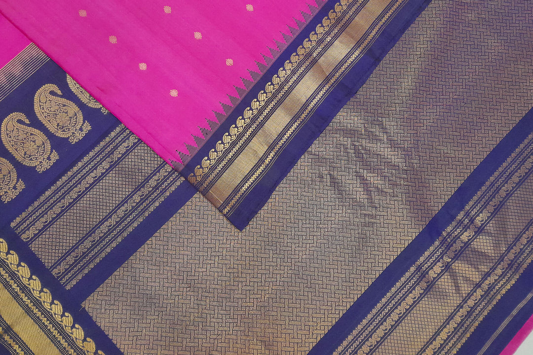 Handwoven Gadwal pure silk saree in pink with gold buttis