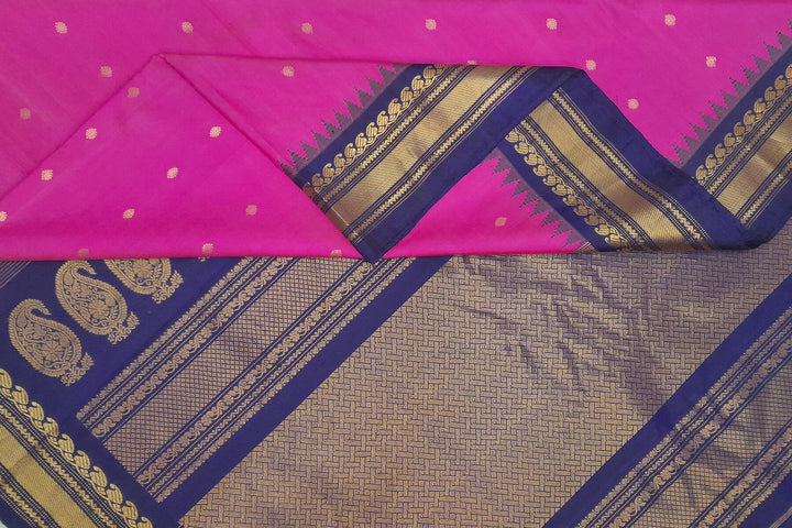 Handwoven Gadwal pure silk saree in pink with gold buttis