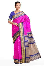 Handwoven Gadwal pure silk saree in pink with gold buttis