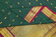 Handloom Gadwal SICO (silk cotton ) saree in bottle green & magenta