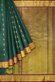 Handloom Gadwal SICO (silk cotton ) saree in bottle green & magenta